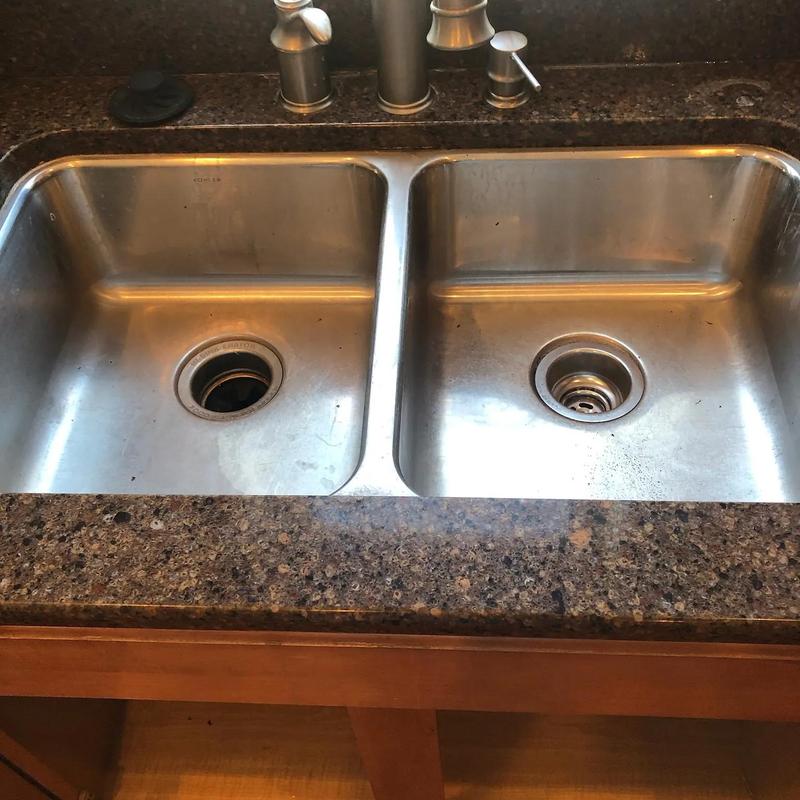 Double kitchen sink drain with faucet above Double kitchen sink drain with faucet above