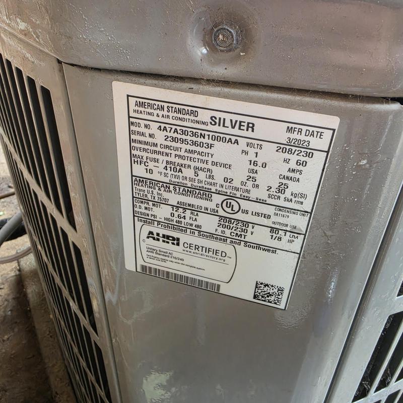 American Standard AC unit label and specs close-up American Standard AC unit label and specs close-up