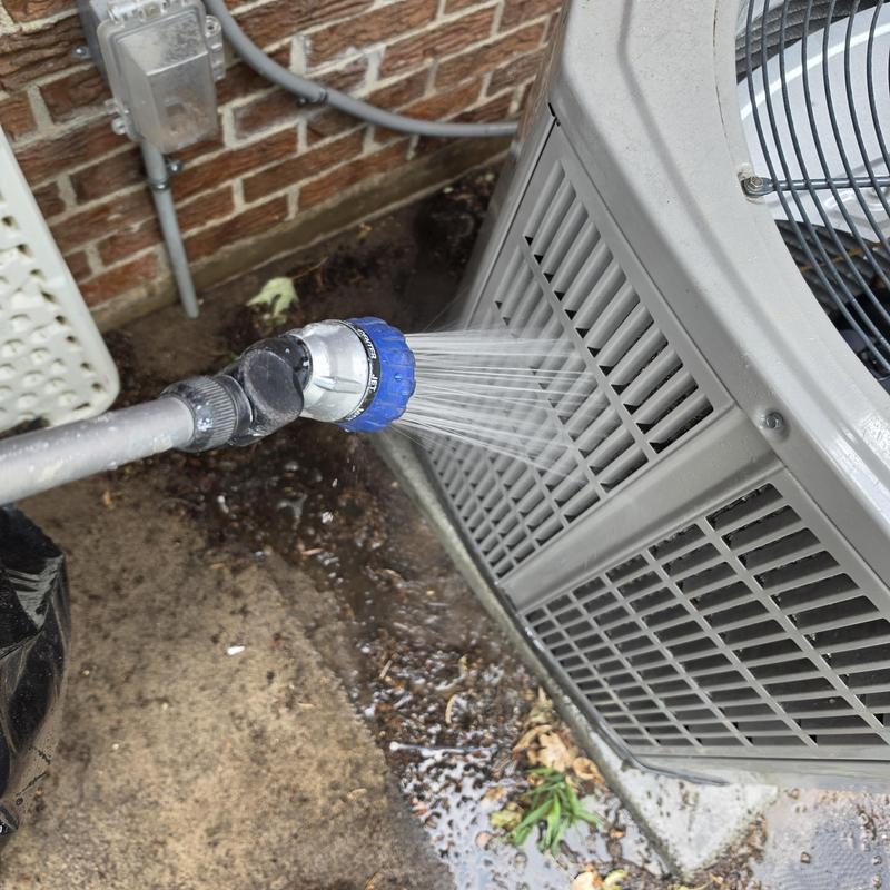 American Standard AC condenser cleaning with hose spray American Standard AC condenser cleaning with hose spray