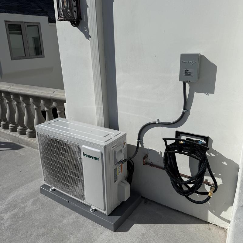 Innovair mini split outdoor unit installation on wall Innovair mini split outdoor unit installation on wall