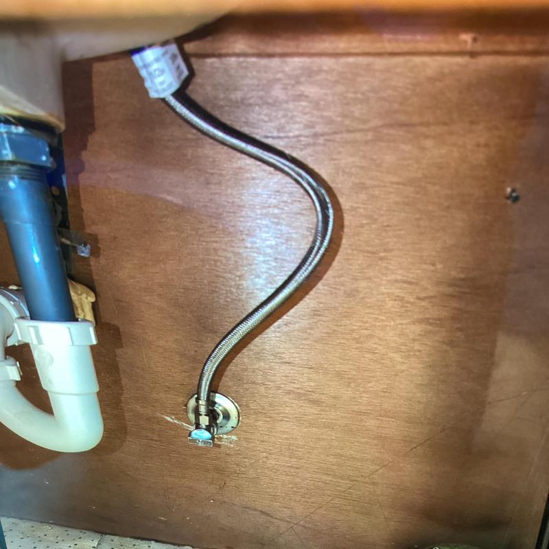 Supply line and shutoff valve inside vanity wall