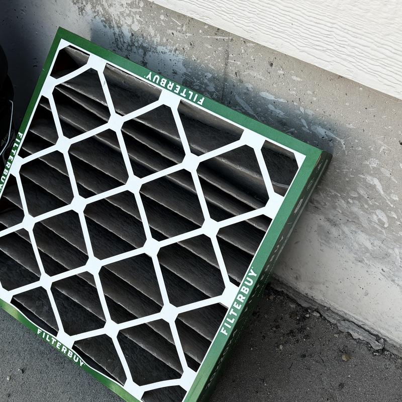 Air filter heavily loaded with dust for heat pump system Air filter heavily loaded with dust for heat pump system
