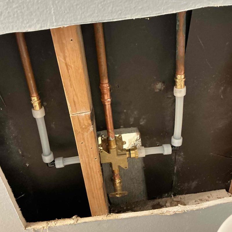 Shower valve plumbing with copper and PEX pipes