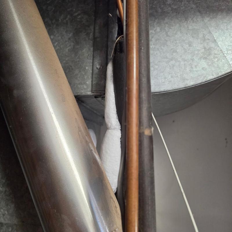 Air conditioner copper coil frozen with ice buildup Air conditioner copper coil frozen with ice buildup