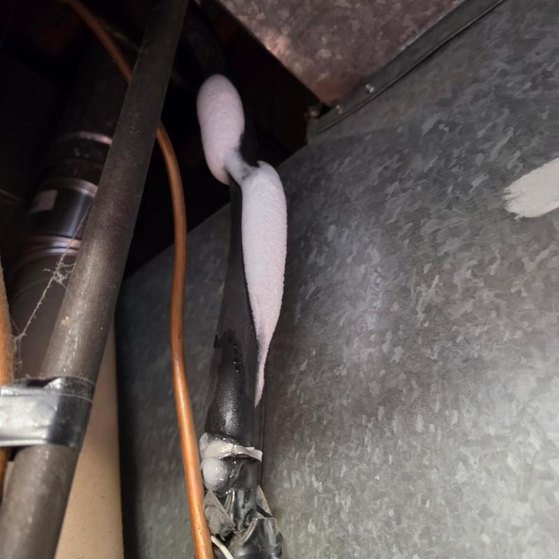AC refrigerant line frozen with ice buildup AC refrigerant line frozen with ice buildup