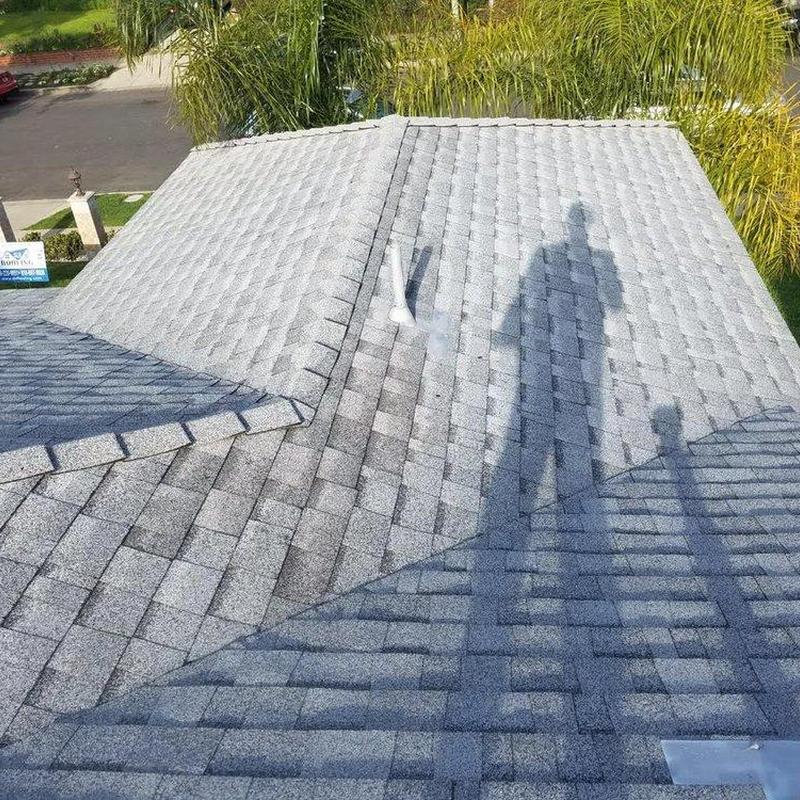 Shingle roof with vent pipe and ridge inspection Shingle roof with vent pipe and ridge inspection