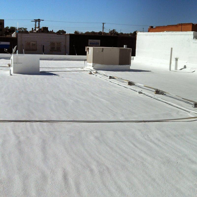Flat commercial roof with HVAC units and wiring installation Flat commercial roof with HVAC units and wiring installation