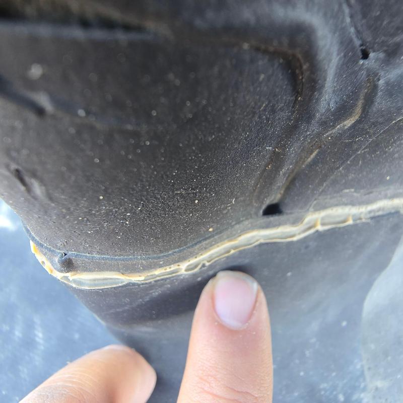 EPDM roof membrane seam separation close-up