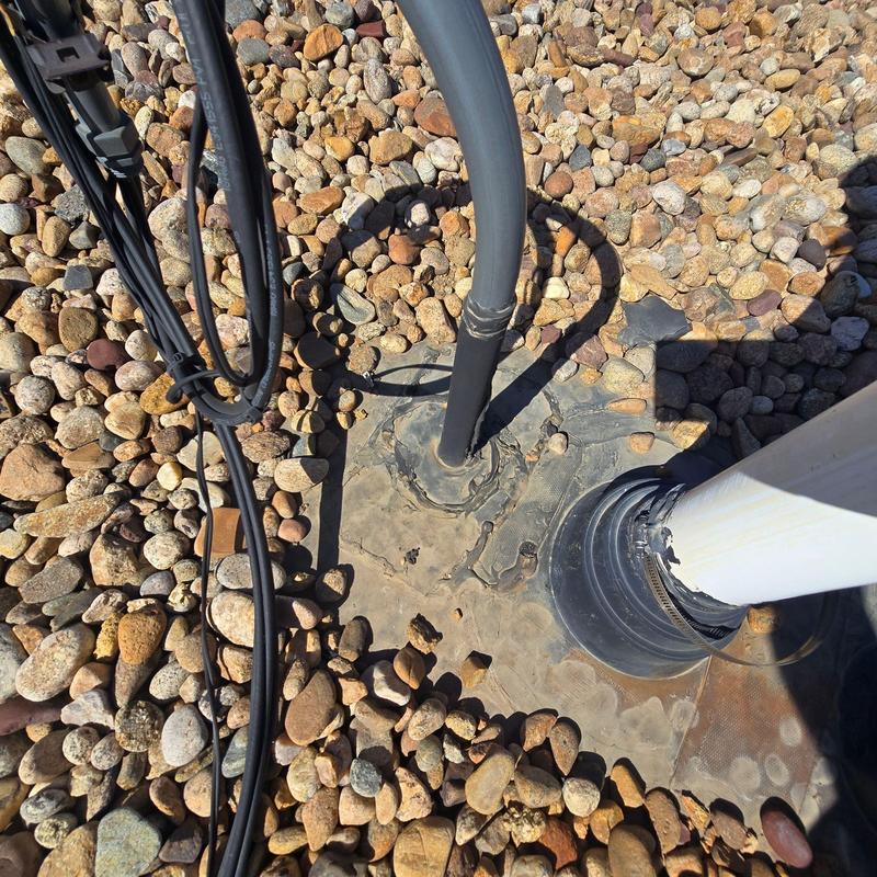EPDM roof pipe jacks and ballast detachment