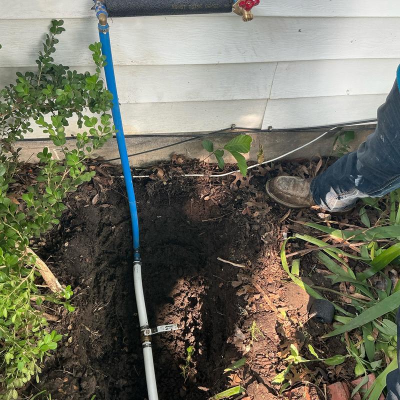 Pex water service line installed in yard trench