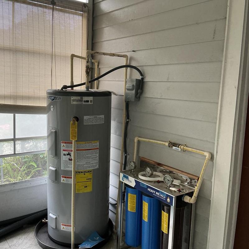 Water heater and heavy metals water filtration system installation Water heater and heavy metals water filtration system installation