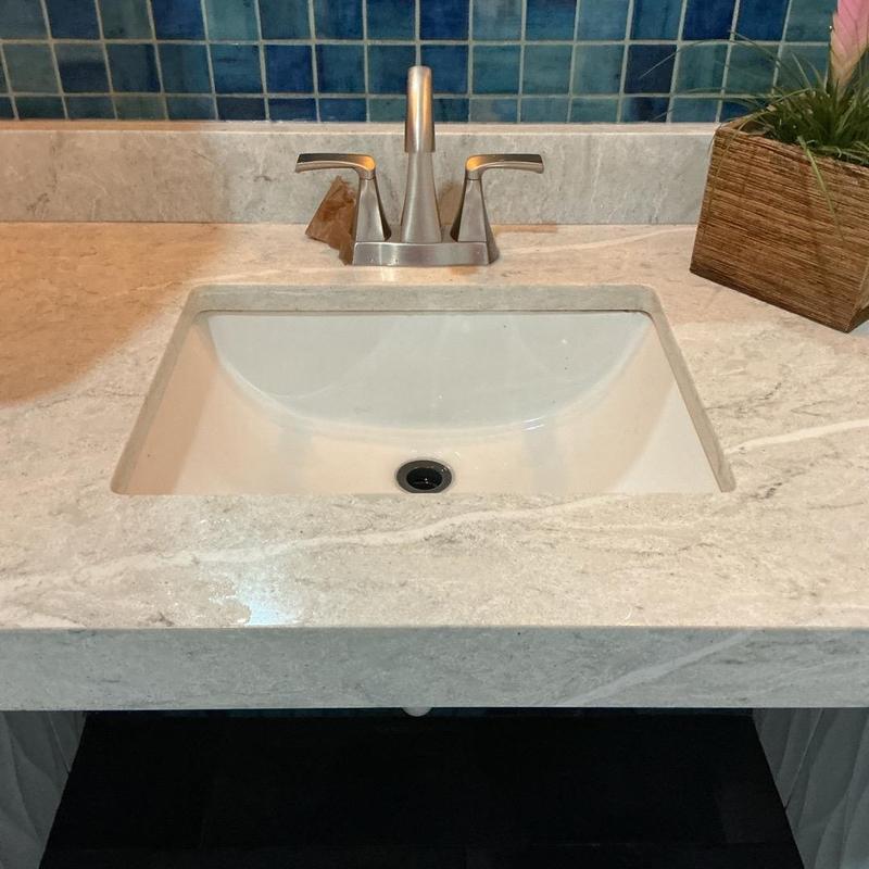 Bathroom sink with faucet and marble countertop Bathroom sink with faucet and marble countertop