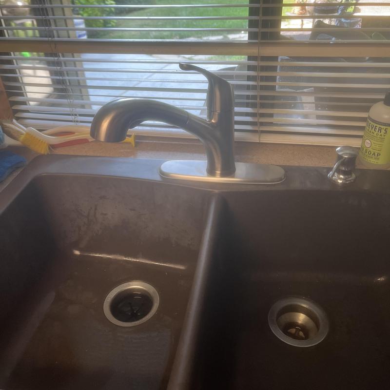 Kitchen sink faucet with soap dispenser installed Kitchen sink faucet with soap dispenser installed