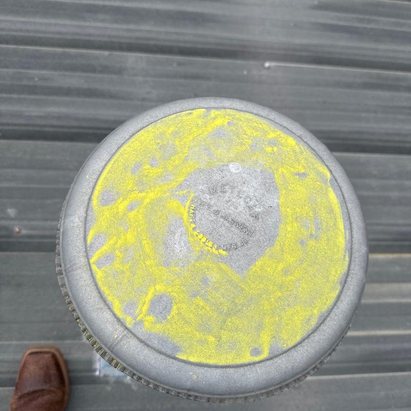 Truck suspension coil spring marked for inspection