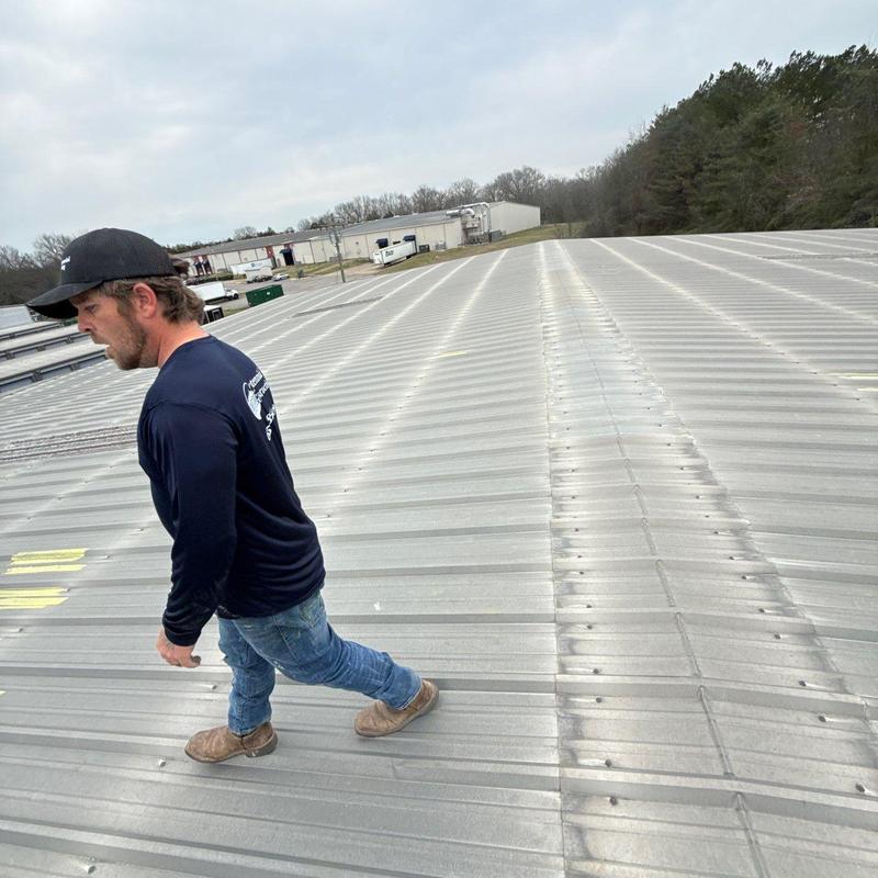 Metal roof inspection with hail damage assessment