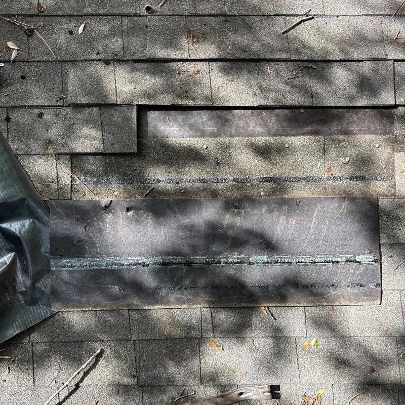 Roofing underlayment exposed during shingle removal