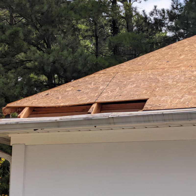 Roof decking installation on rear roof section Roof decking installation on rear roof section