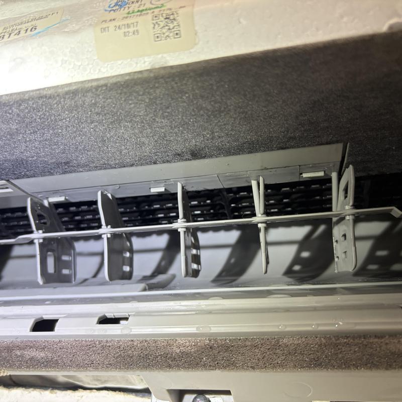 Indoor mini-split air handler vane assembly close-up view Indoor mini-split air handler vane assembly close-up view