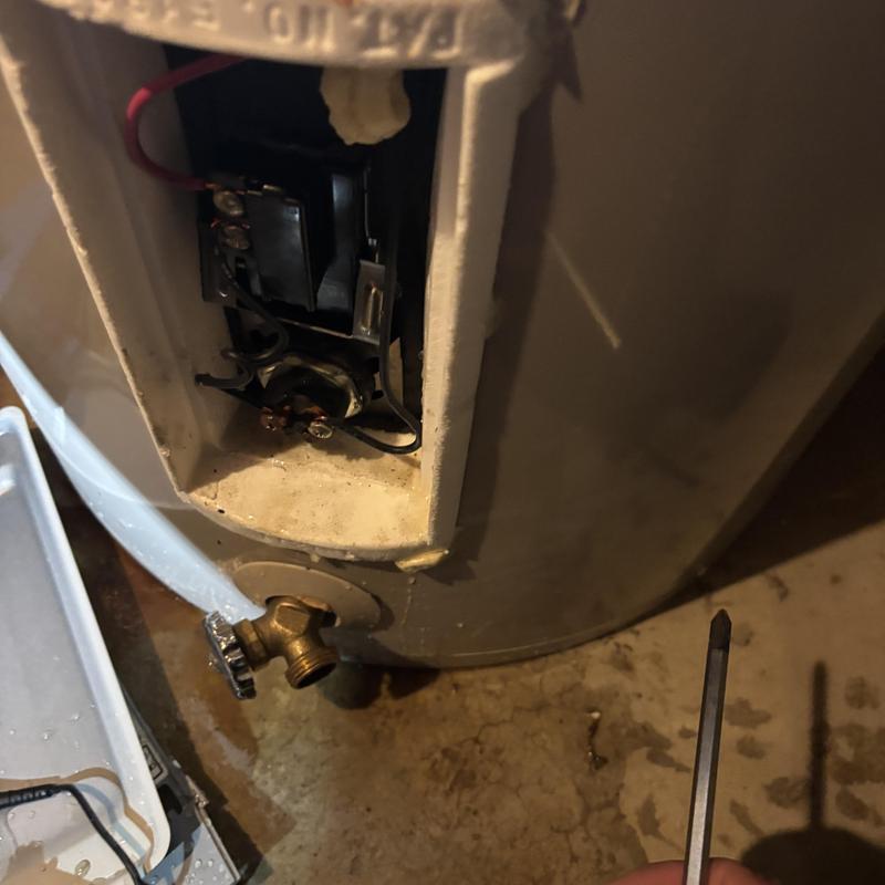 Water heater element replacement with tools nearby Water heater element replacement with tools nearby
