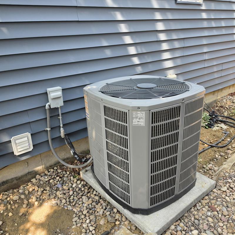 American Standard air conditioner unit outside home American Standard air conditioner unit outside home