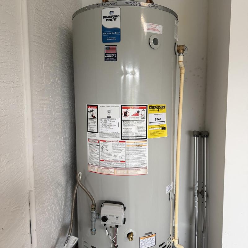Natural gas water heater installation with vent hookup