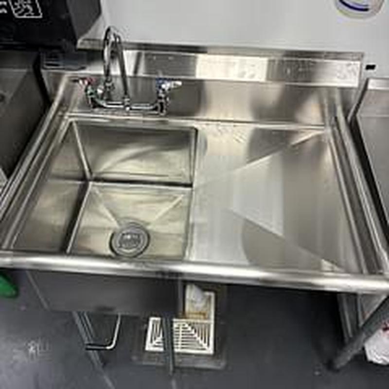 Stainless steel prep sink with new faucet installation Stainless steel prep sink with new faucet installation