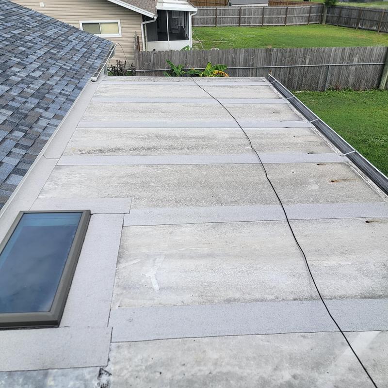 Flat roof with skylight and gutter in Palm Bay Flat roof with skylight and gutter in Palm Bay