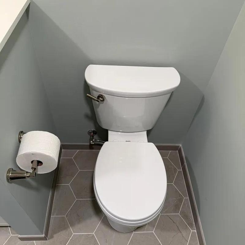 Toilet fixture installation in remodeled bathroom Toilet fixture installation in remodeled bathroom