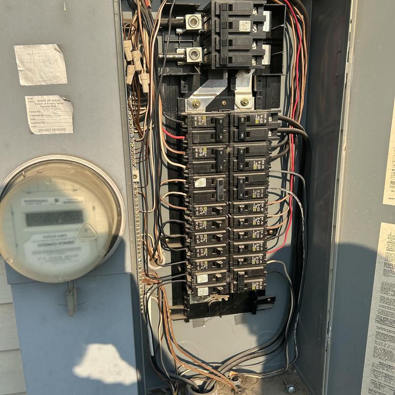 Electrical breaker panel with multiple circuit breakers installed