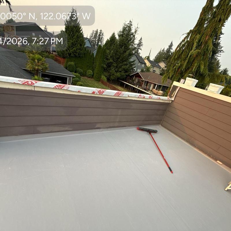 Flat roof membrane installation with edge flashing detail