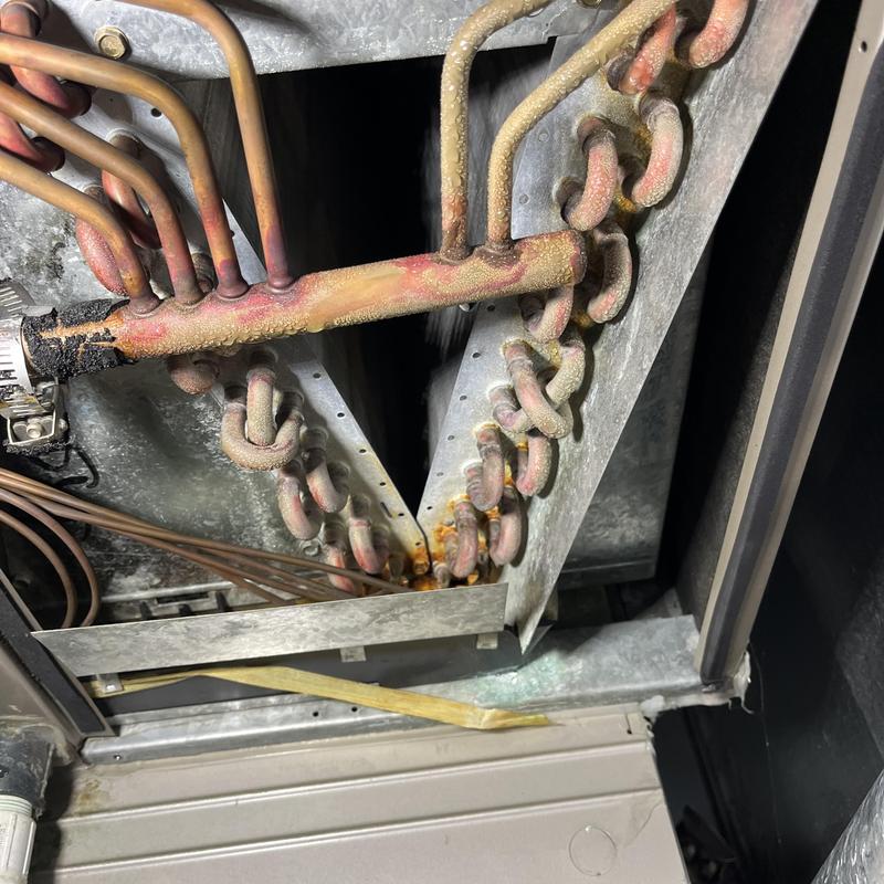 Air handler copper coil with corrosion and leakage signs Air handler copper coil with corrosion and leakage signs
