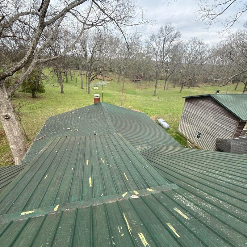 Metal roofing panels with hail damage in Tennessee