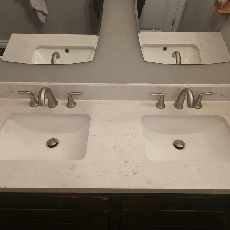 Eight-inch lavatory faucets installed on double sink vanity Eight-inch lavatory faucets installed on double sink vanity
