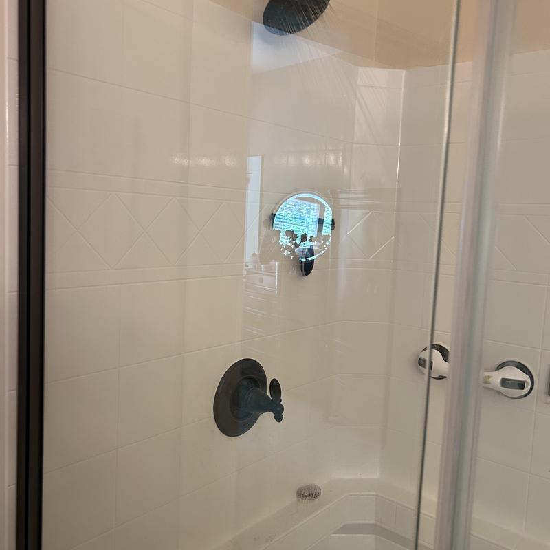 Shower valve and handle inside glass shower enclosure Shower valve and handle inside glass shower enclosure