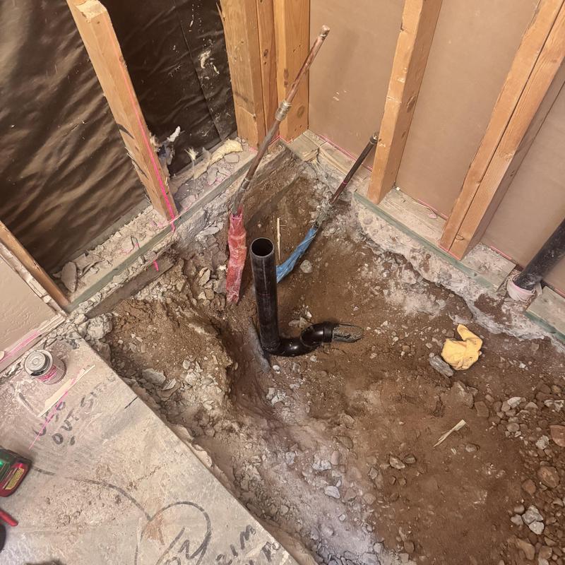Shower drain and plumbing rough-in in bathroom remodel Shower drain and plumbing rough-in in bathroom remodel