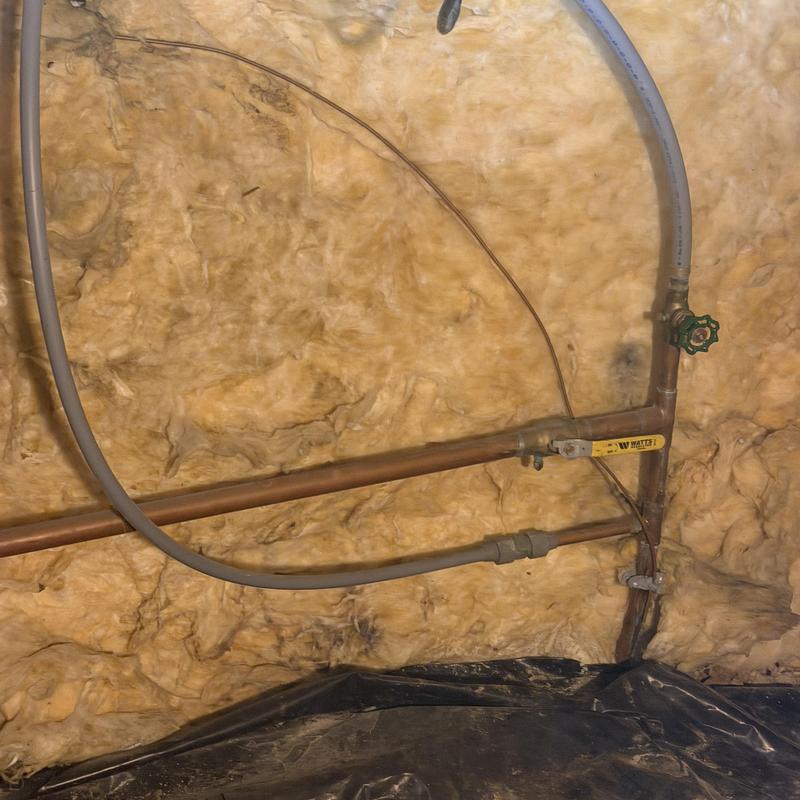 Copper water line and valve with insulation background Copper water line and valve with insulation background
