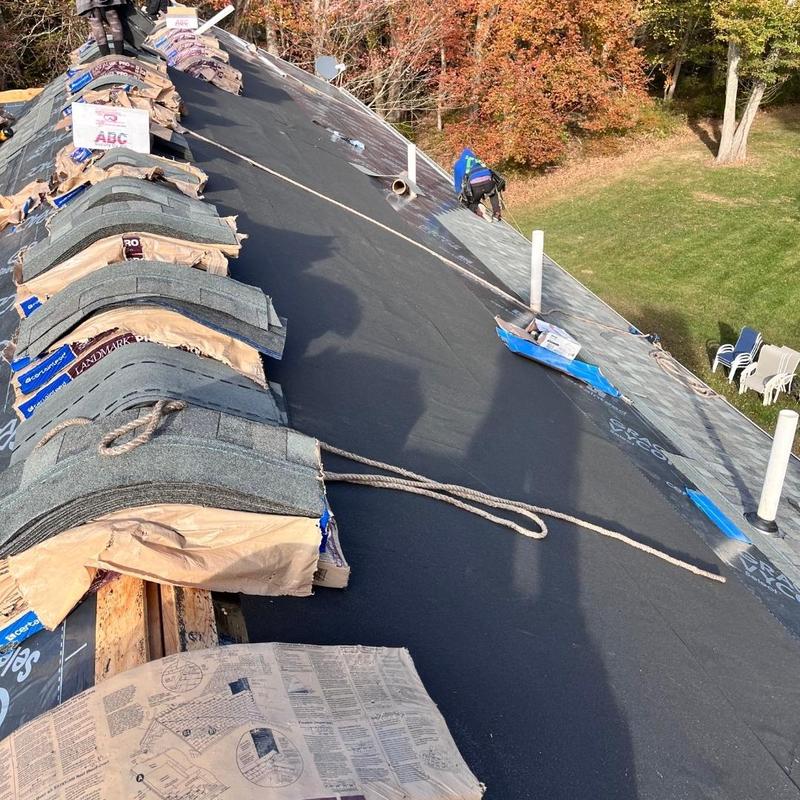 CertainTeed Landmark Pro shingles stacked on roof deck CertainTeed Landmark Pro shingles stacked on roof deck