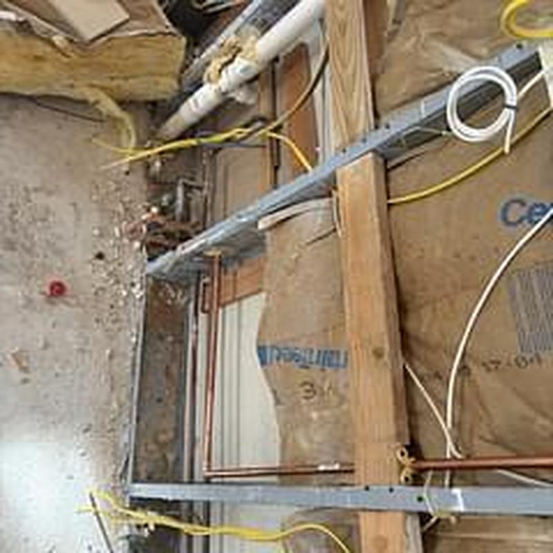 Gas line stub relocation under kitchen cabinet
