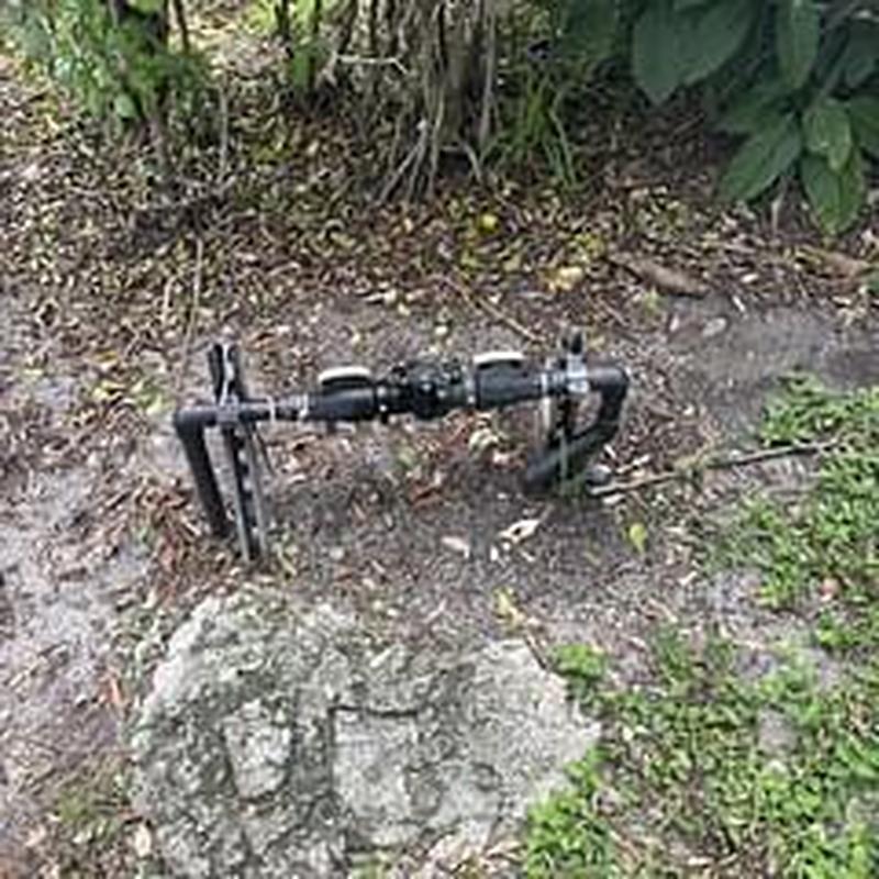 Backflow prevention device installed underground outdoors