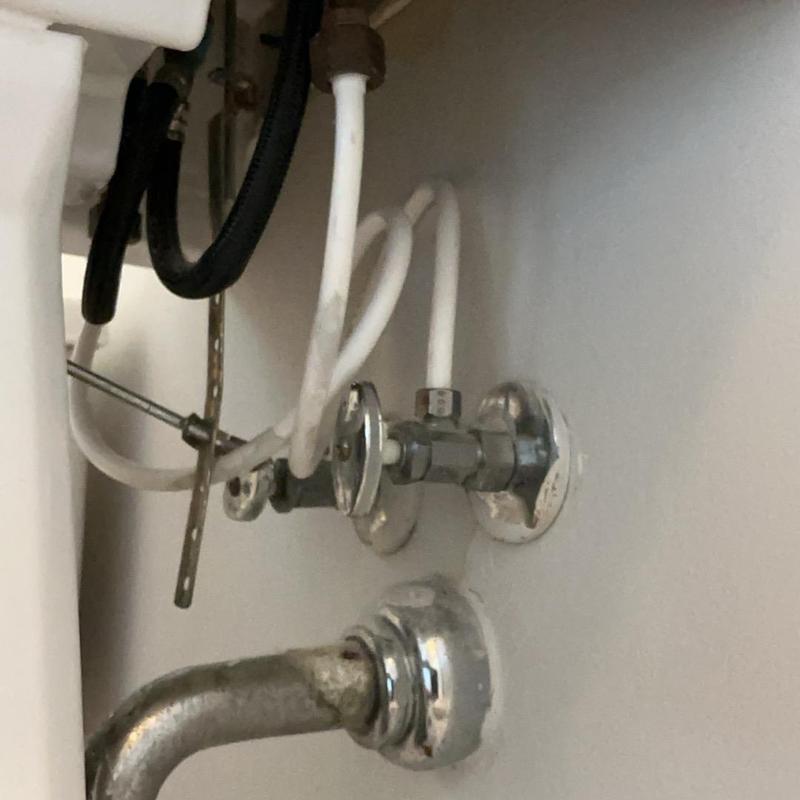 Laboratory sink angle stop valves and supply lines under sink Laboratory sink angle stop valves and supply lines under sink