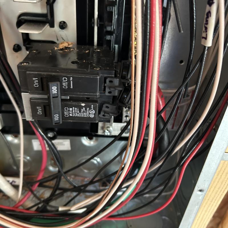Circuit breaker panel with wiring in electrical system Circuit breaker panel with wiring in electrical system