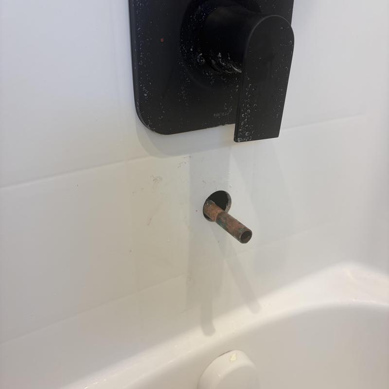 Tub spout pipe exposed below shower faucet handle Tub spout pipe exposed below shower faucet handle