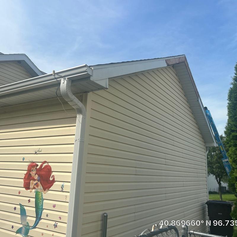 Fascia board replacement on residential home exterior Fascia board replacement on residential home exterior