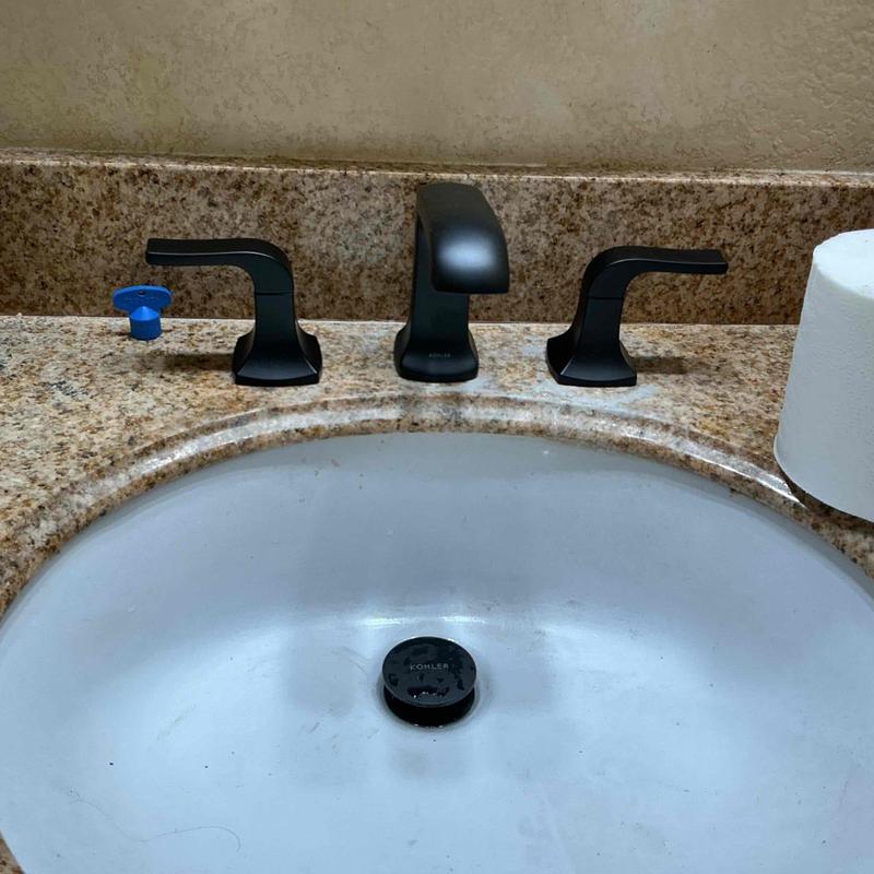 Widespread black bathroom faucet and pop-up assembly