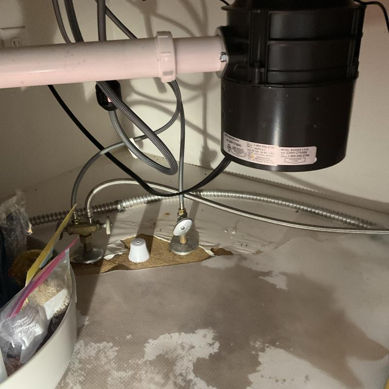 Kitchen sink drain and water supply lines under cabinet Kitchen sink drain and water supply lines under cabinet