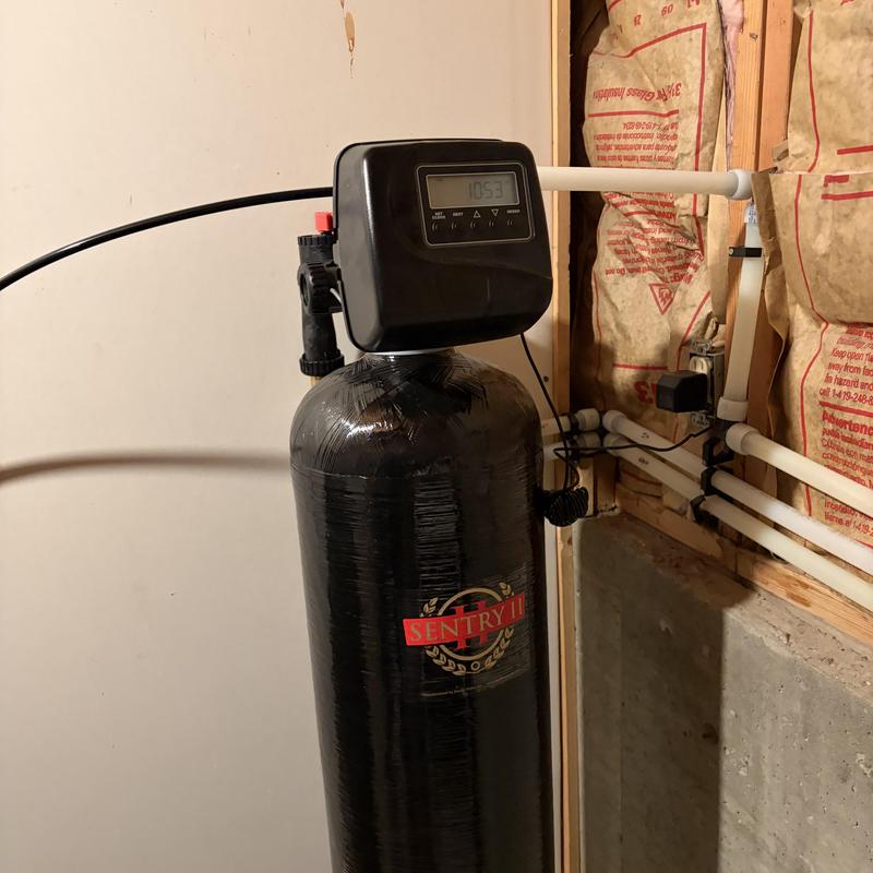 Water softener system with new piping loop installation Water softener system with new piping loop installation