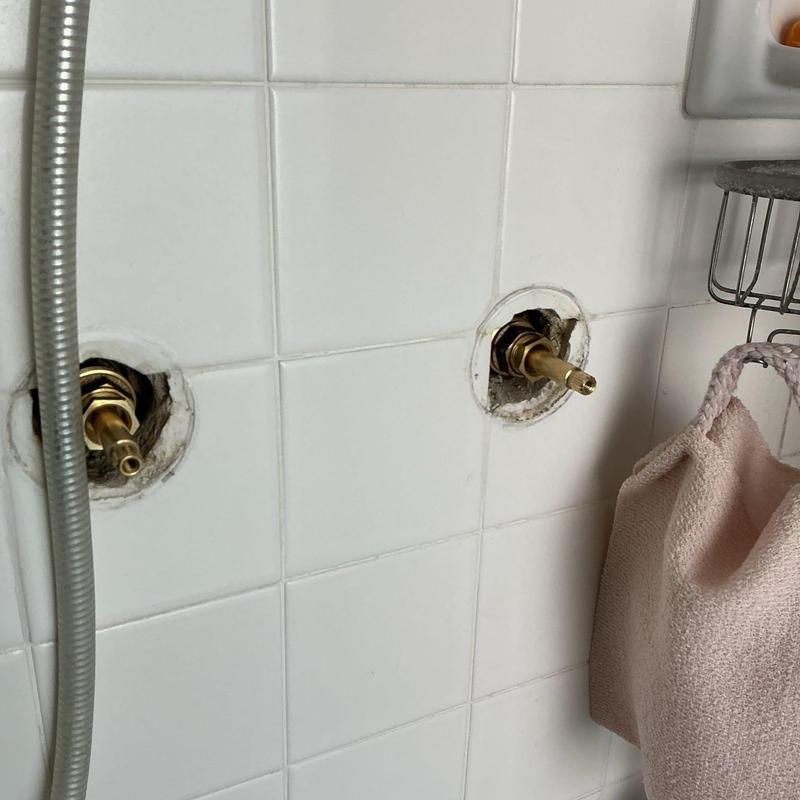 Price Pfister shower cartridge installation in bathroom