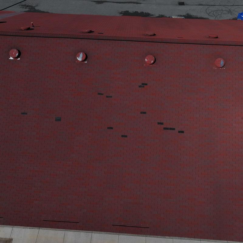 Commercial roof with hail damage from inspection