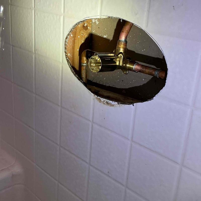 Moen Posi-Temp shower valve installed in wall cavity