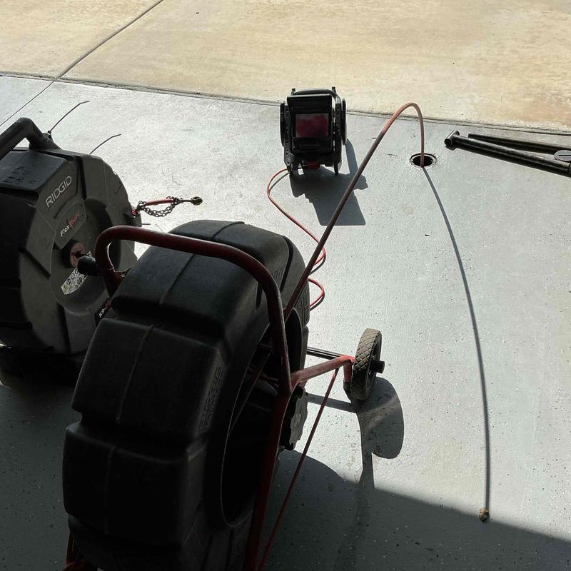 Sewer mainline mechanical cabling with CCTV inspection equipment